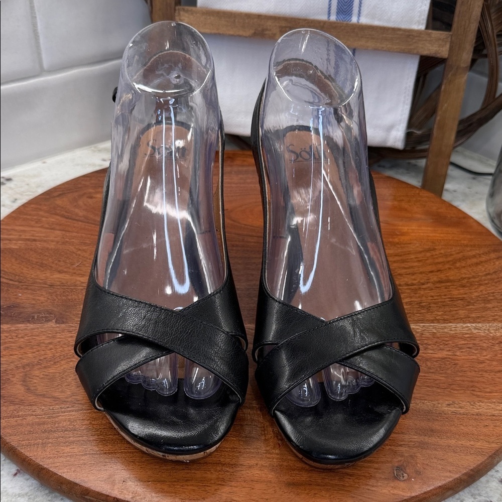 Söfft black leather sling-back wedge sandals.